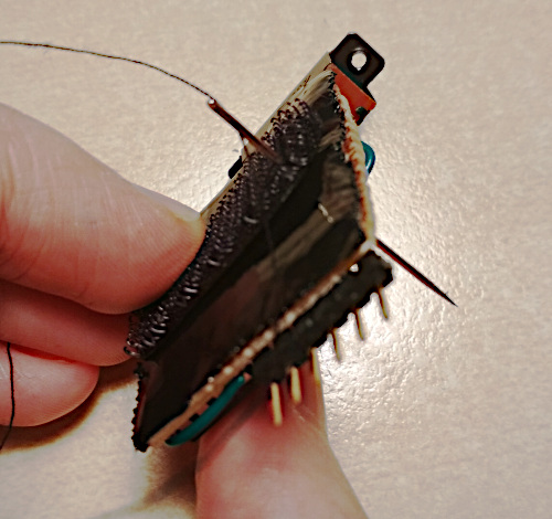 photo of me sewing velcro to the power supply module
